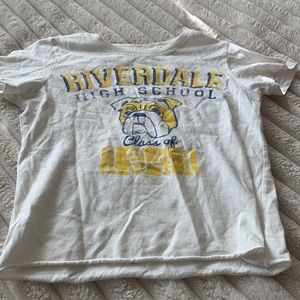 Can be worn as an adult crop top size small in girls but pretty loose